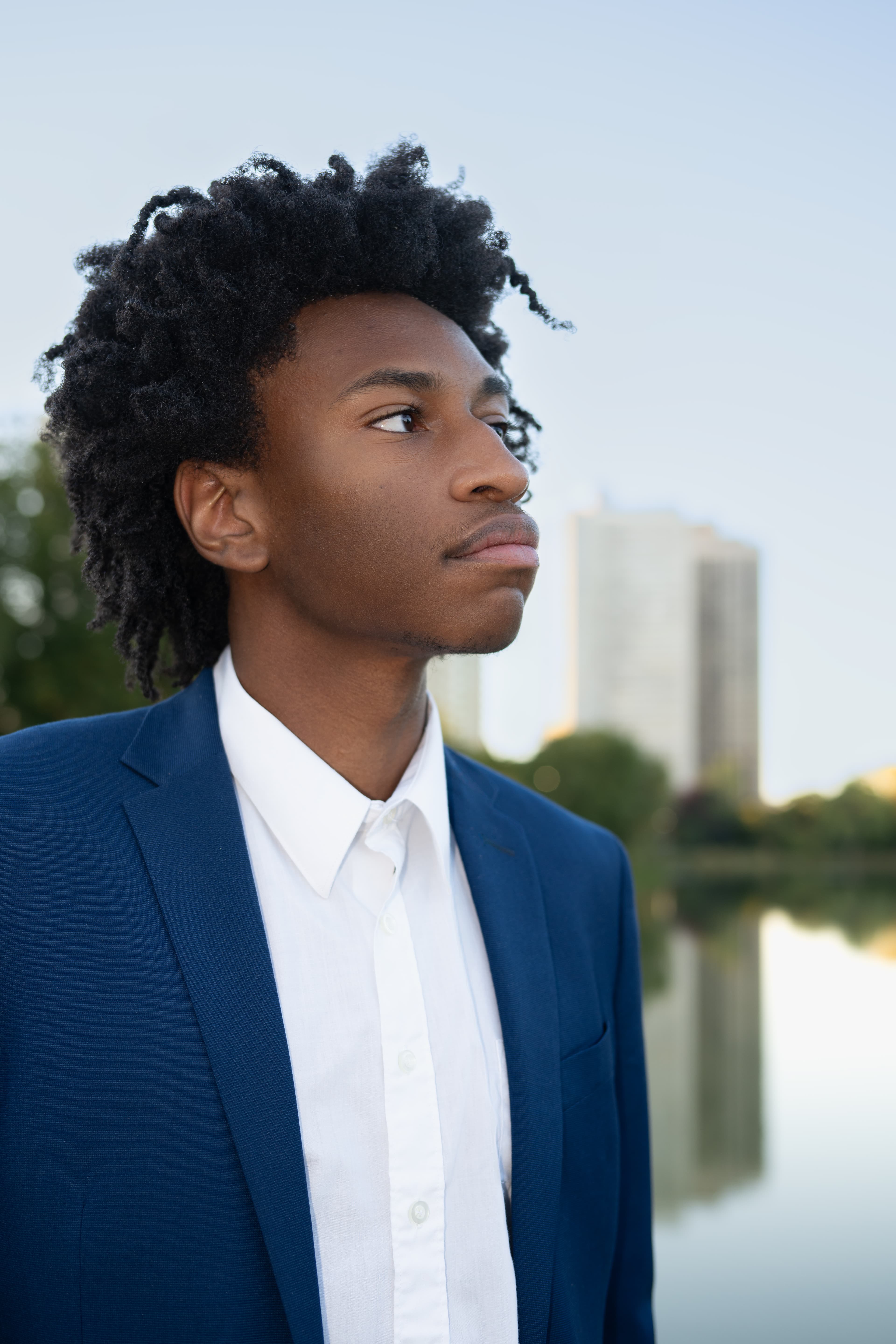 Blue suit — lakefront, golden hour