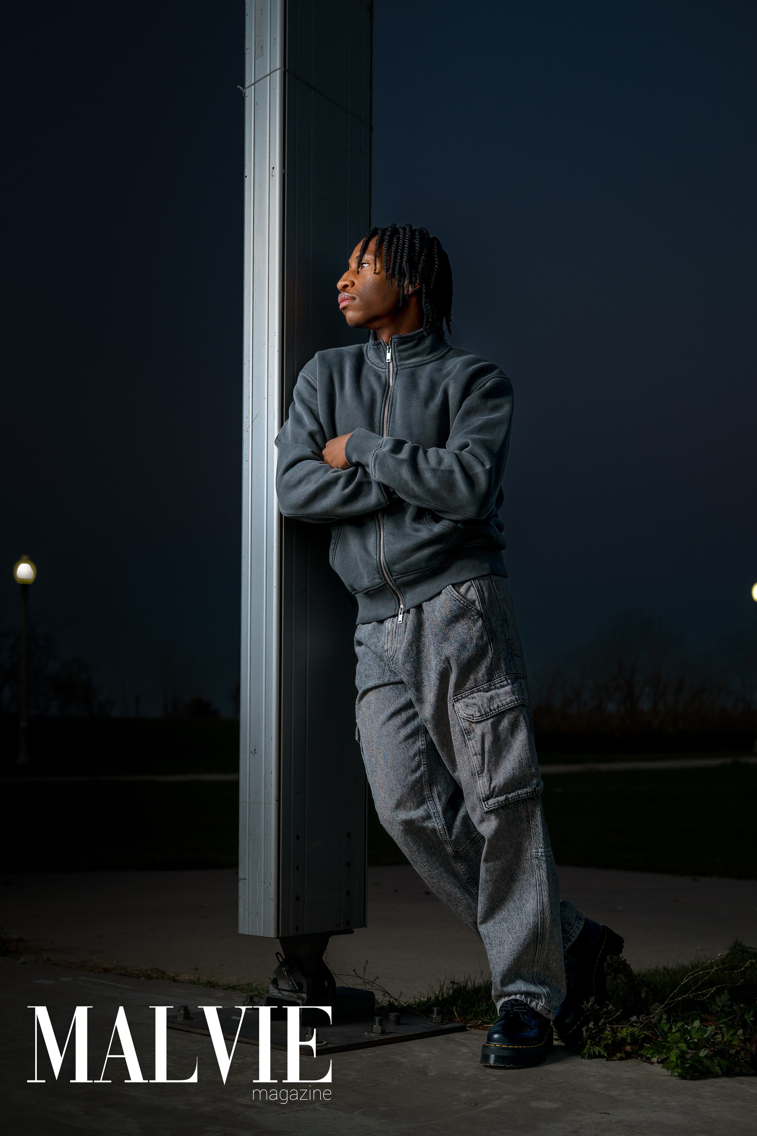 MALVIE Magazine — leaning on post, night